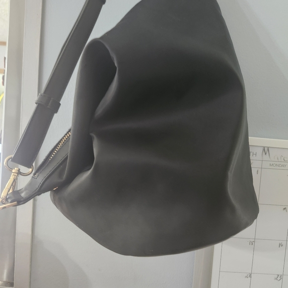 A new day convertible sling backpack - Picture 3 of 4